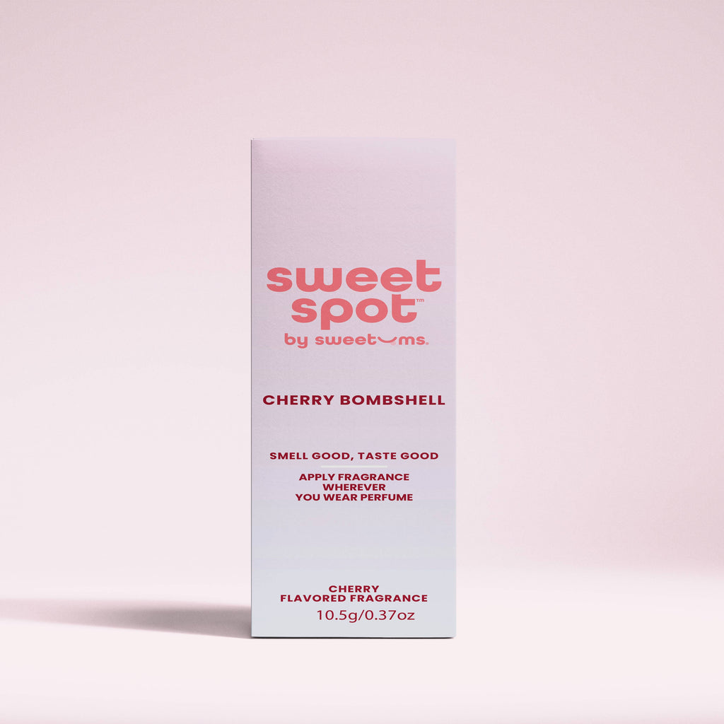 Sweet Spot by Sweetums Cherry Bombshell fragrance packaging on a light pink background