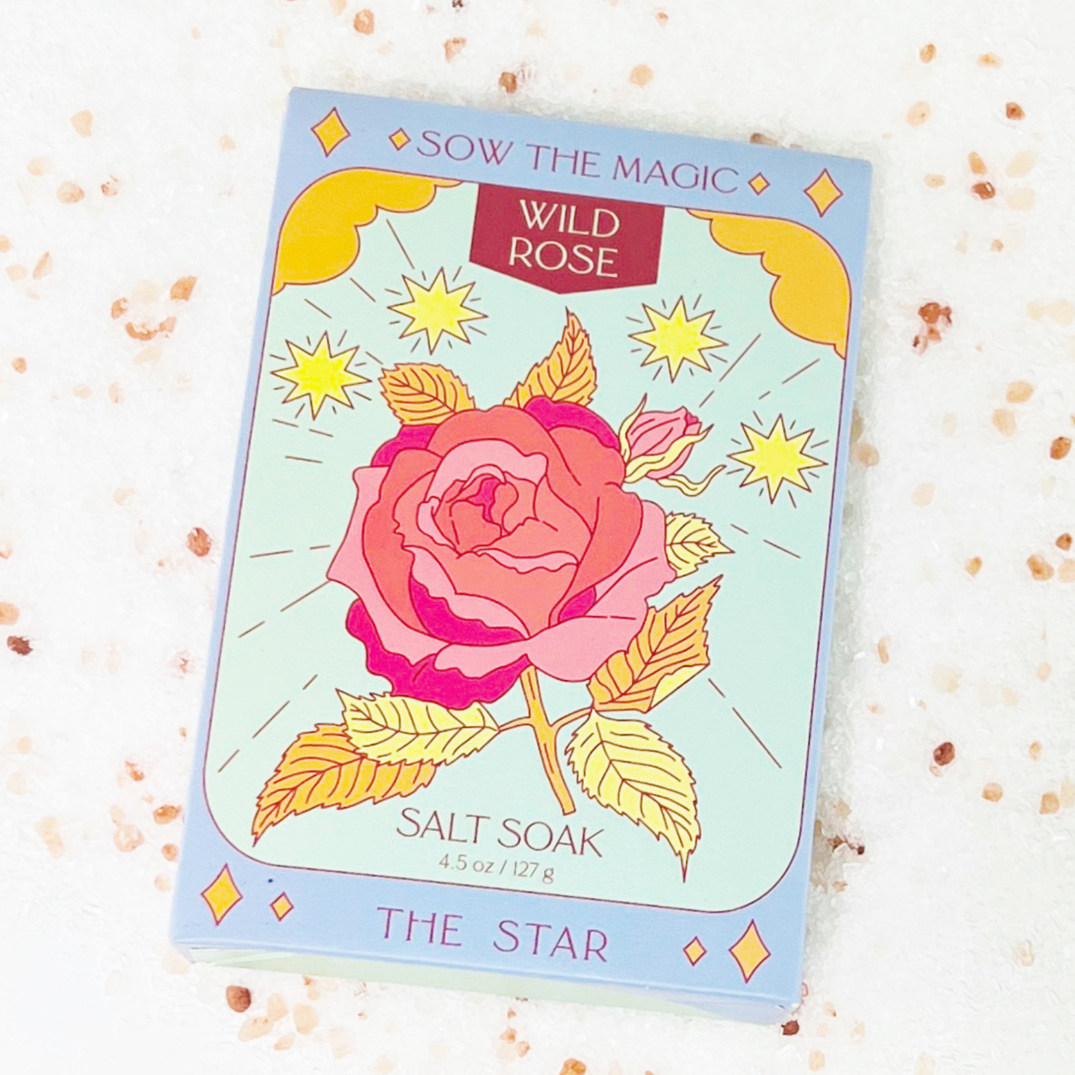 Salt soak packaging with a rose design on a white background