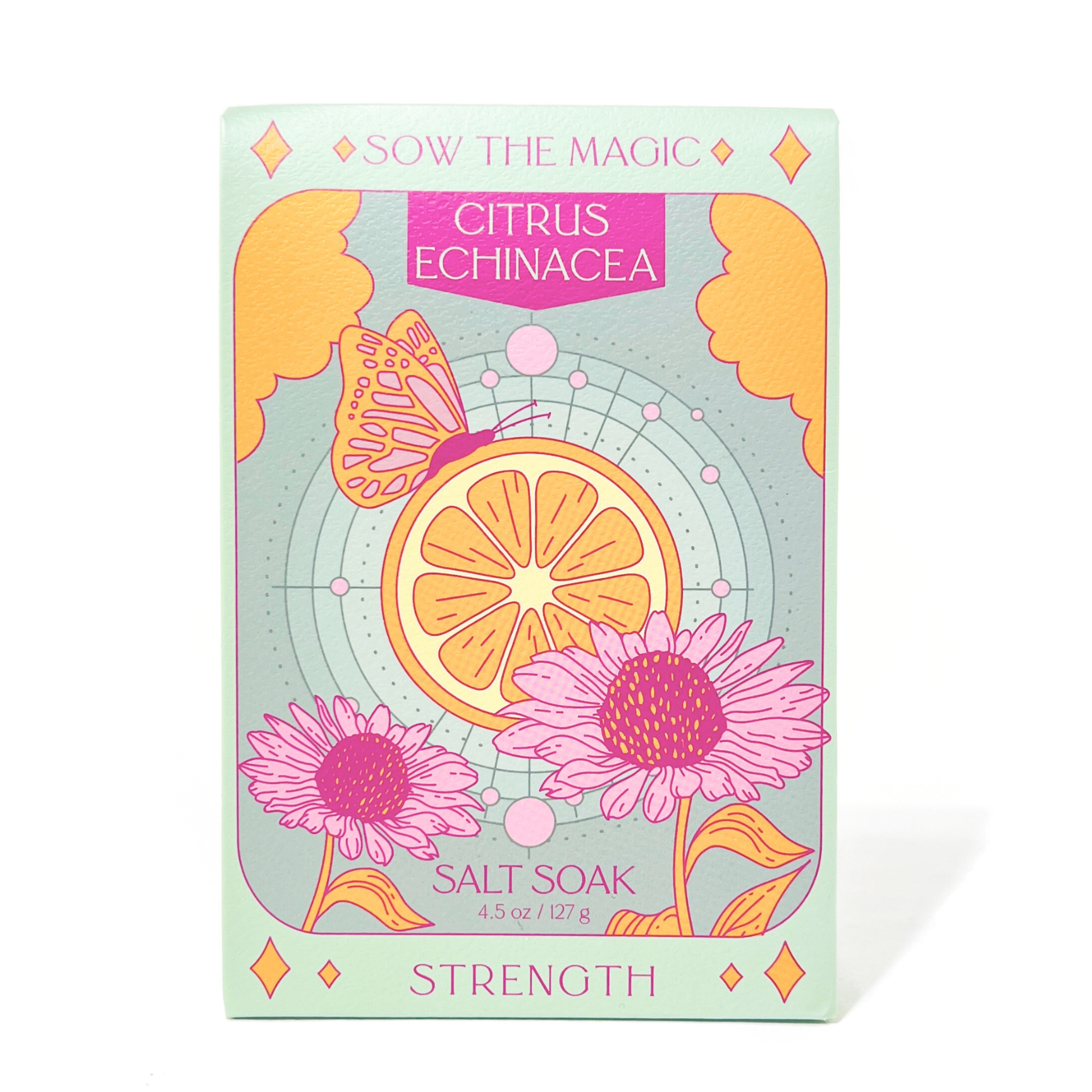 Salt soak packaging with citrus and echinacea design on a light blue background