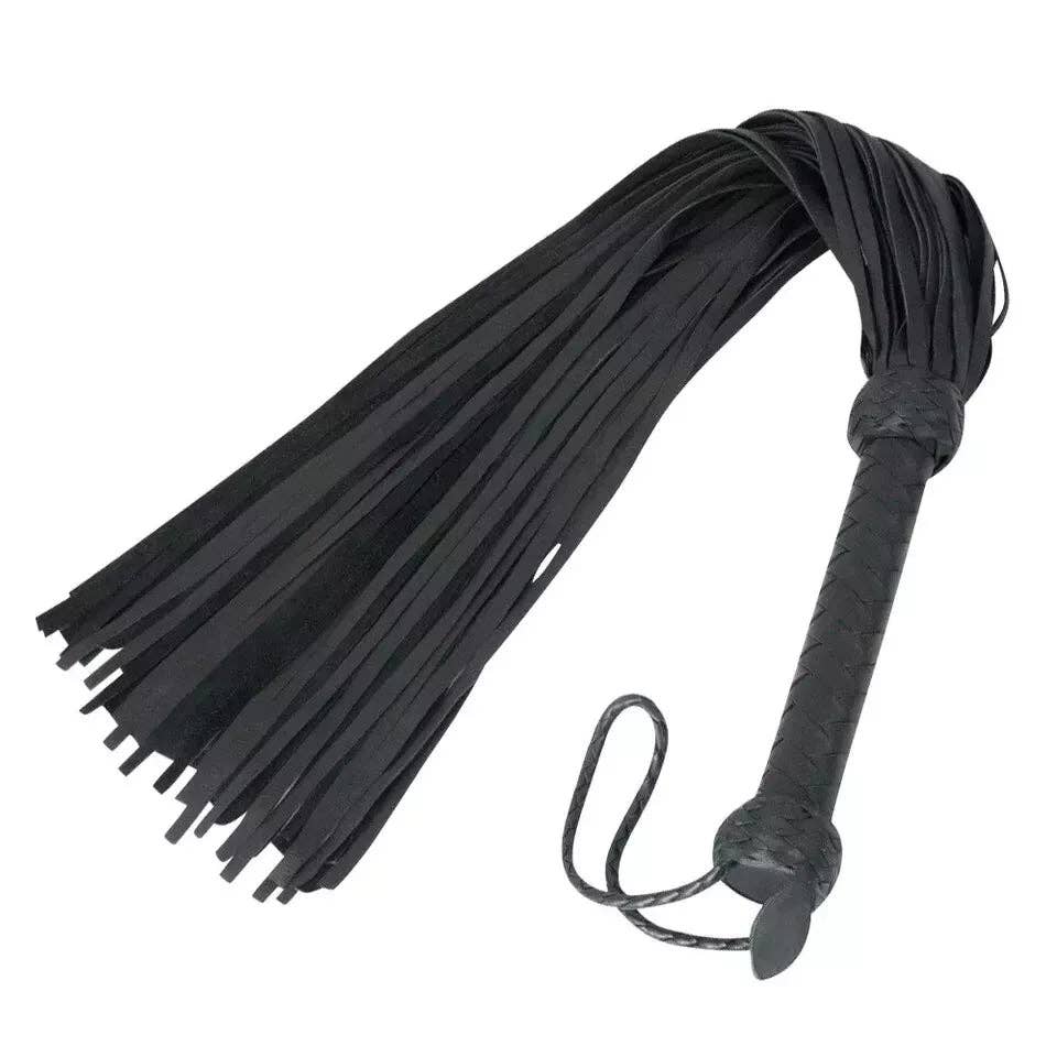 Black leather flogger with a long strap and a wrapped handle, shown on a plain white background.
