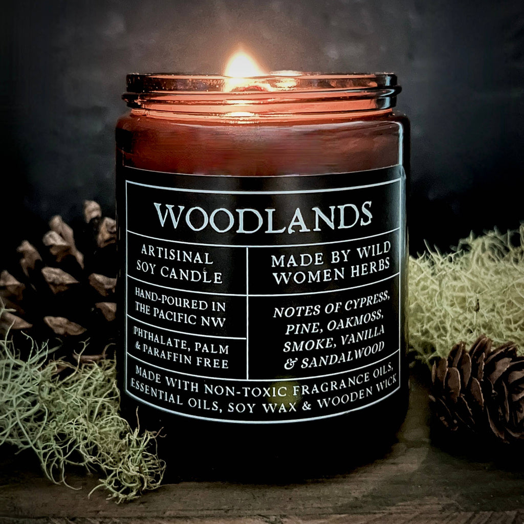 Woodlands candle with label on a dark background
