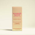 Sweet Spot by Sweetums Golden Vanilla fragrance packaging on a beige background