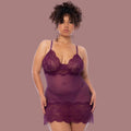 Model wearing an elegant deep wine color , slightly sheer babydoll.