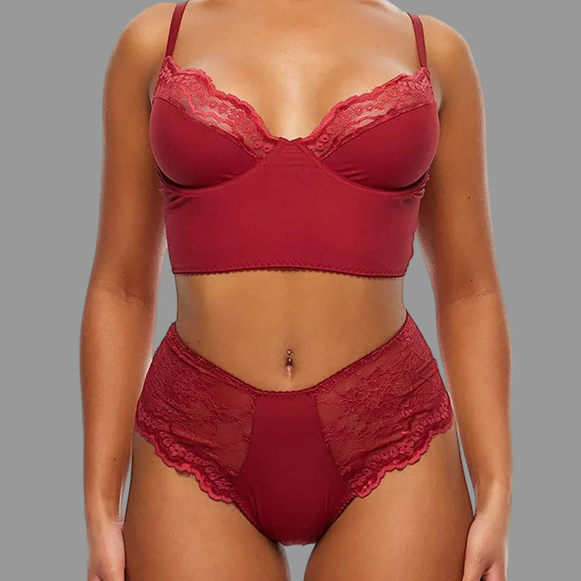 Woman wearing a red lingerie set on a white background