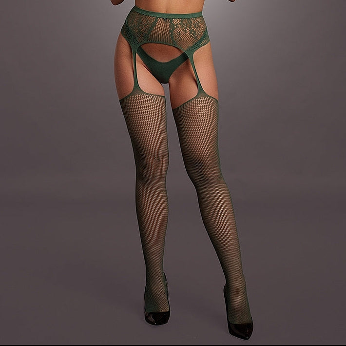 Woman wearing a green lingerie set against a gray background