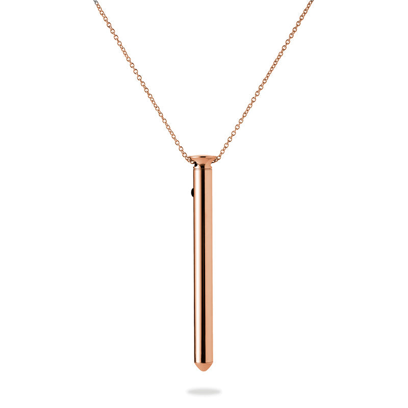 A thin, elegant, metal vibe on a chain.