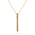 A thin, elegant, metal vibe that hangs on a necklace chain.