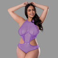 Light purple teddy that has panty style bottoms, a halter top that connect in an hour glass shape at the front abdomen.