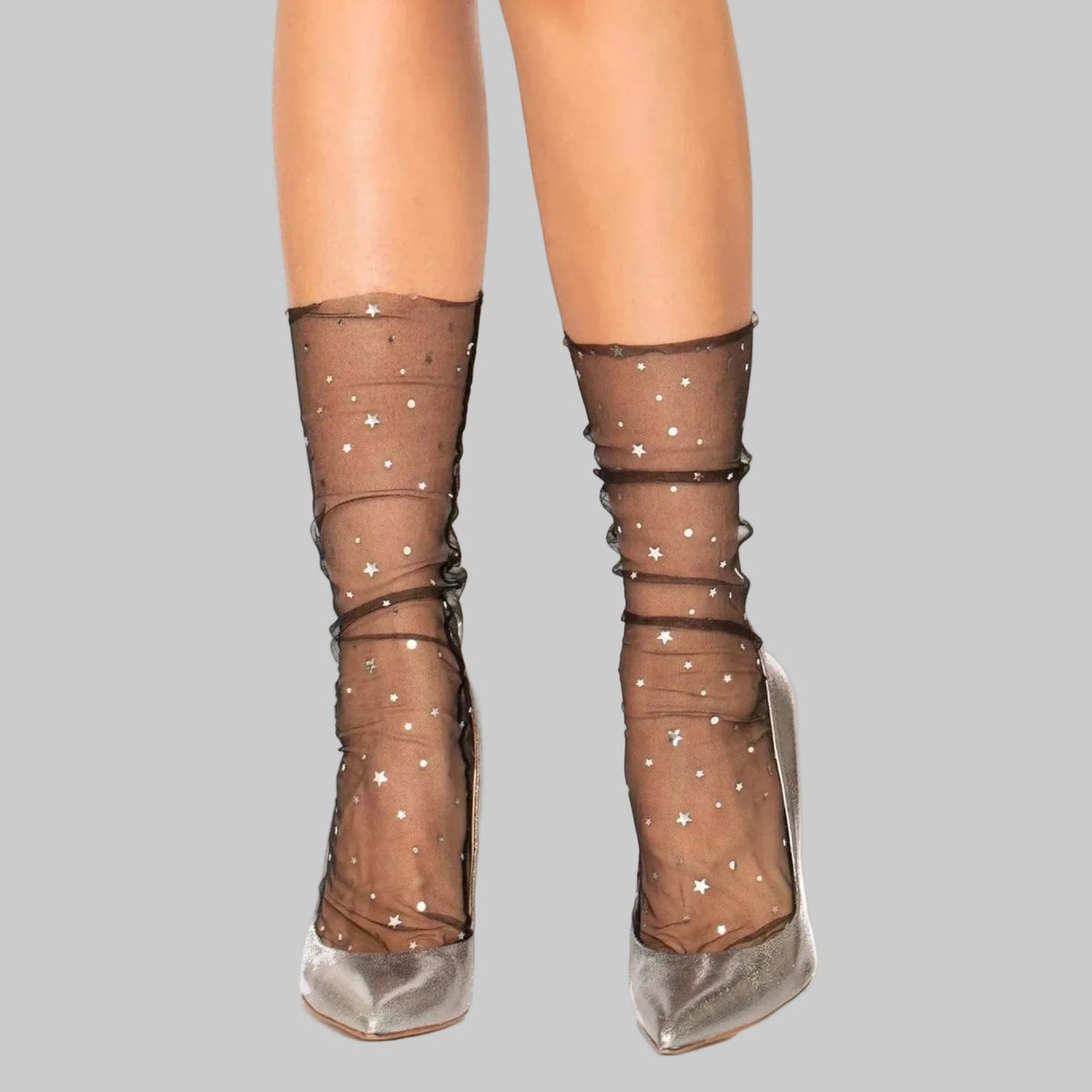 Sheer ankle socks with silver metallic stars and moons.