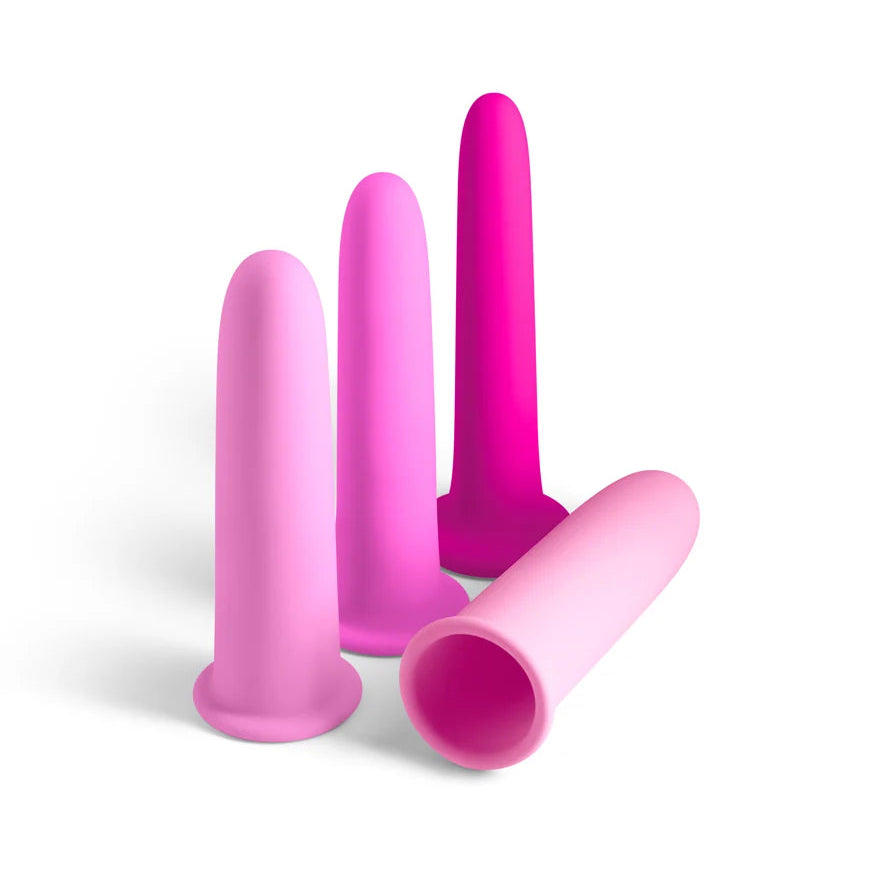 A set of four vaginal dilators that nest inside each other.