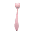 A thin, 8.25 inch massage want with a head that is little kitten ears.