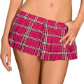 A close-up of a model wearing a bright pink pleated mini skirt with a white and black plaid pattern, shown against a plain white background.