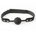 A silicone ball gag, rived onto velvet straps. Velcro closure.