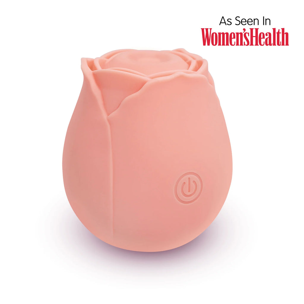 Pink tulip-shaped device with a power symbol on a white background, featuring 'Women's Health' branding.
