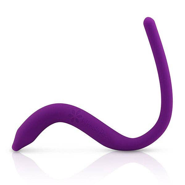 Purple curved tool, thinner on one end.