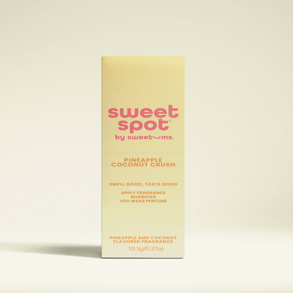 Sweet Spot by Sweetums pineapple coconut crush perfume packaging on a beige background