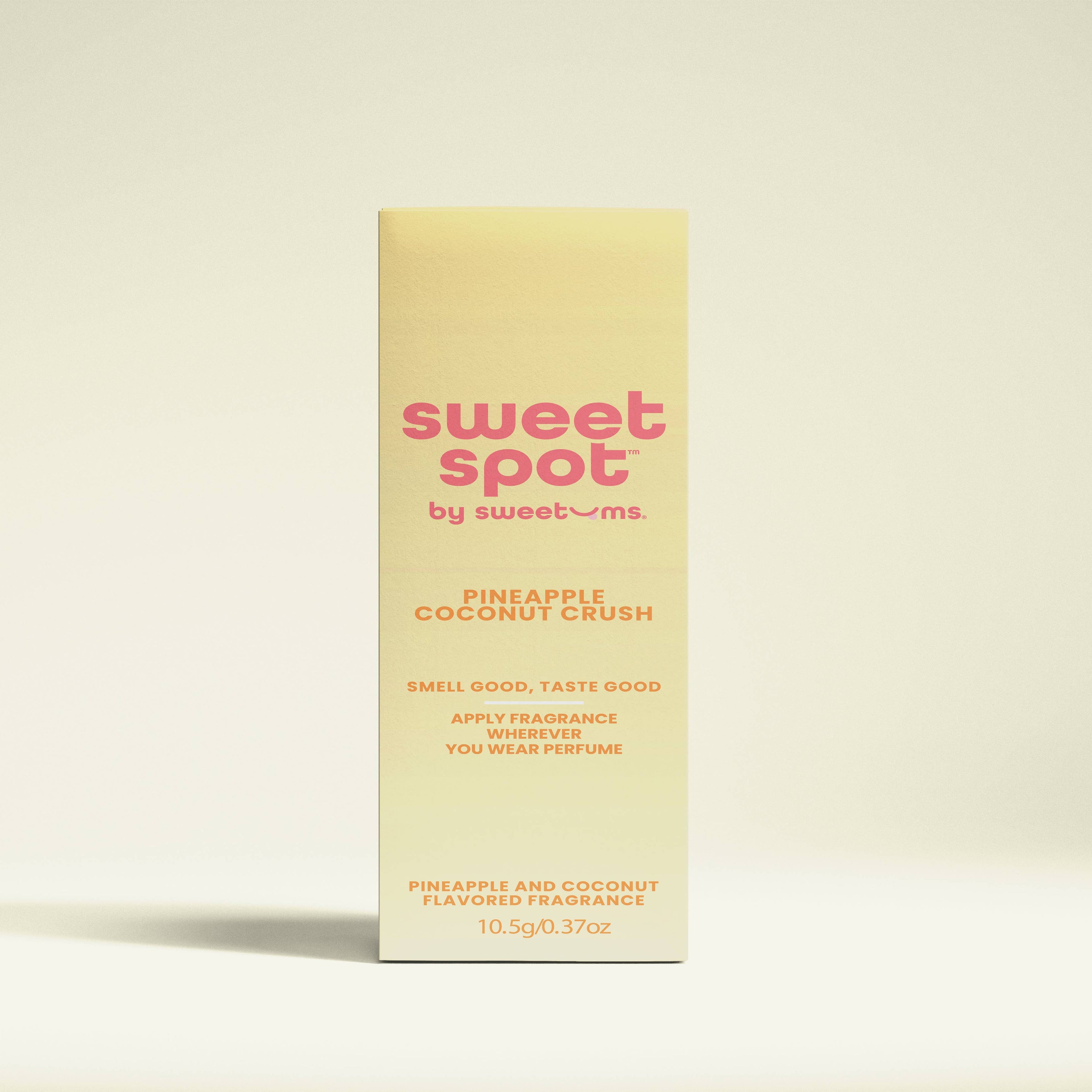 Sweet Spot by Sweetums pineapple coconut crush perfume packaging on a beige background