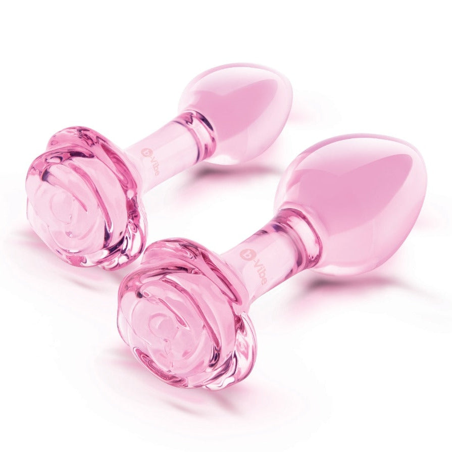 Pink glass plugs on a white background with text indicating suitability for all levels.