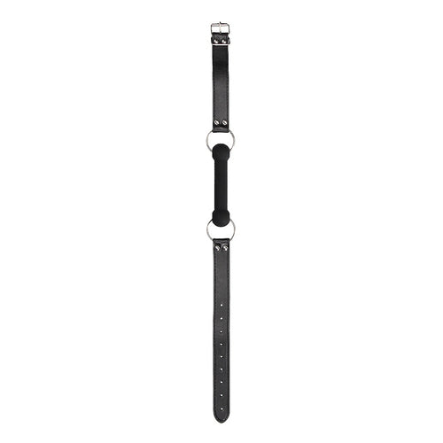 A silicone bit, that is wide and slim. Looks like a horses bit. Leather strap and silver buckle.
