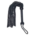 Black leather flogger with a curved shaft, multiple hanging leather strips, and a looped wrist strap, shown on a plain white background.