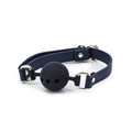 Simple ball gag with three breath holes, faux leather straps and gold buckle.