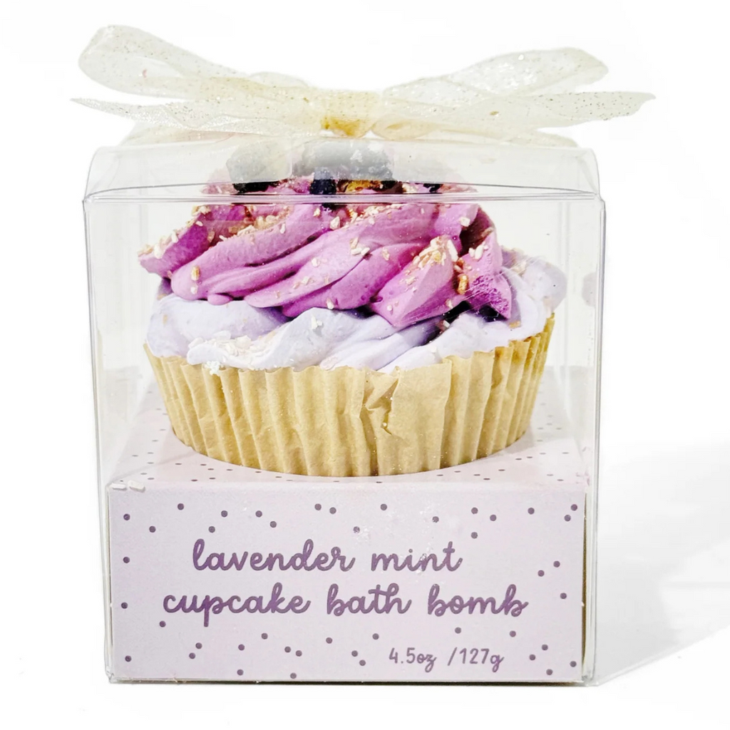 A bath bomb shaped exactly like a sweet cupcake, but with floral herds as decoration.