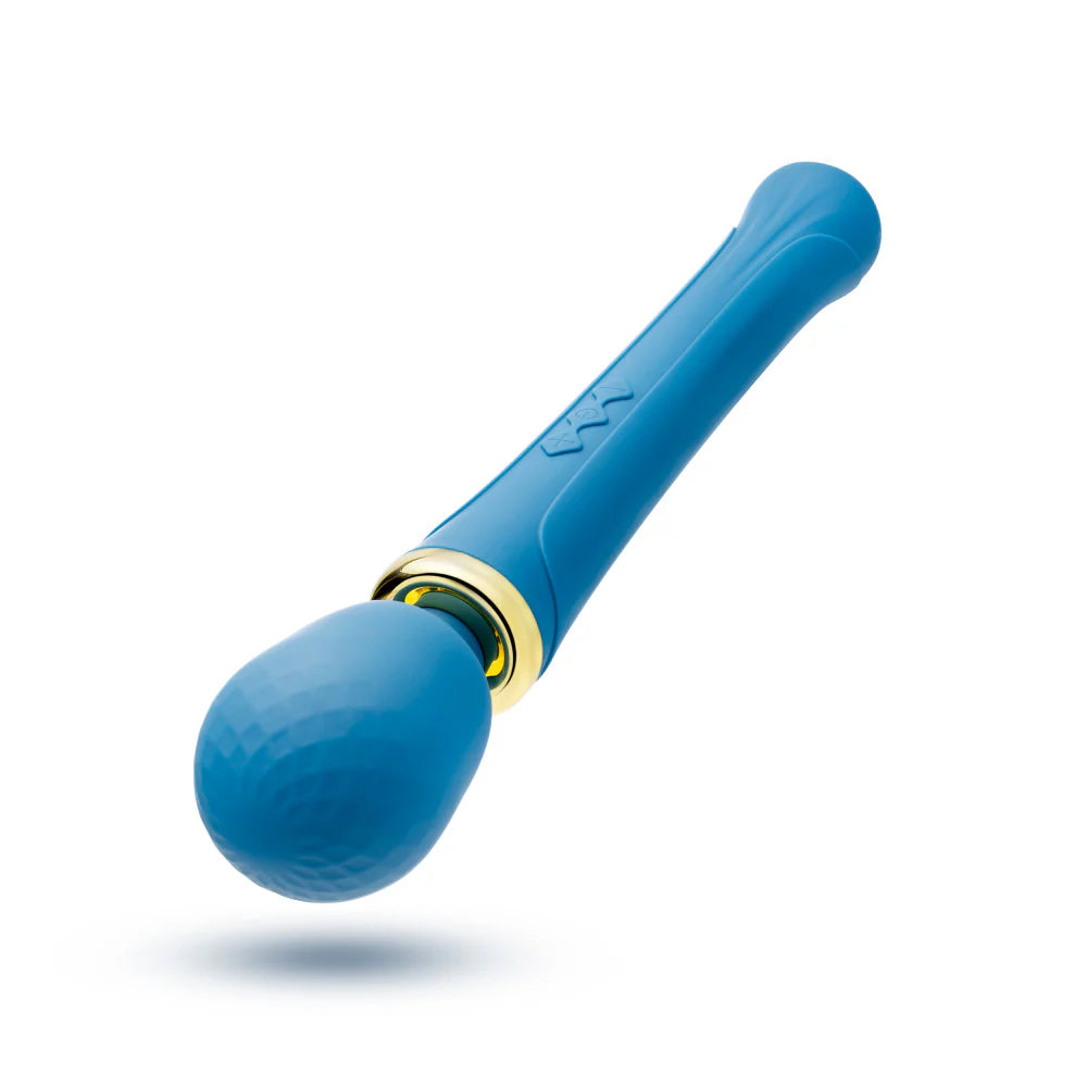 A close up of the silicone bulbous head of the massage wand. It has a slight geometric texture.