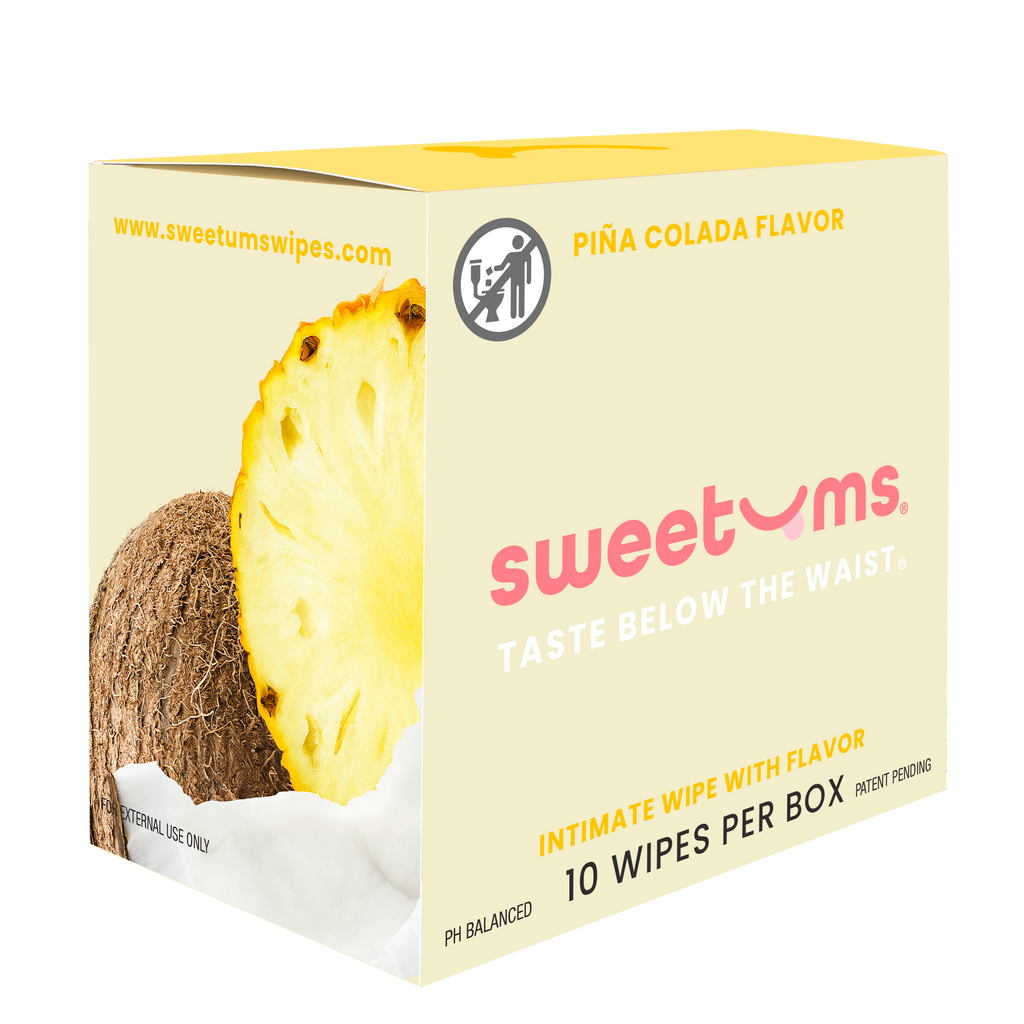 Box of sweetums intimate wipes with pineapple and coconut imagery on a white background