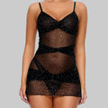 Black sheer slip worn by a model on a white background