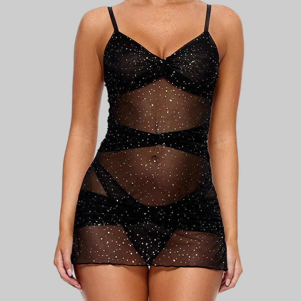 Black sheer slip worn by a model on a white background