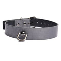 Close up of the collar, showing a unique U-shaped ring a with a round bulb as the rivet holding it to the faux leather collar.