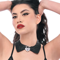 This collar looks like a feminine collar you might see on a dress. It locks in the center with a heart-shaped lock.