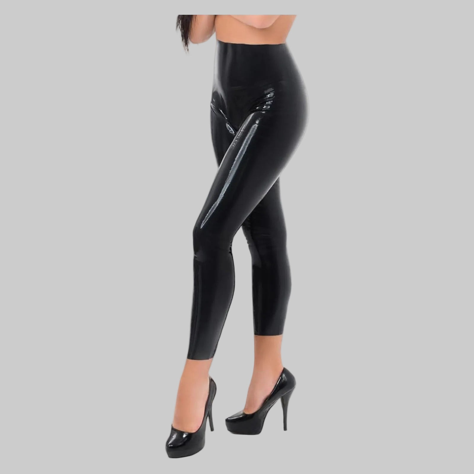 Black latex leggings with a high waist.