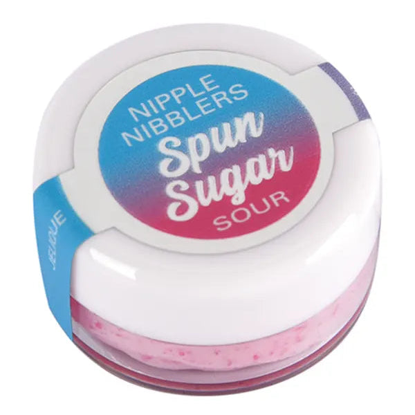 A small round container of Nipple Nibblers Spun Sugar Sour candy, showing pink candy inside a clear base with a white lid and a blue-to-pink gradient label.
