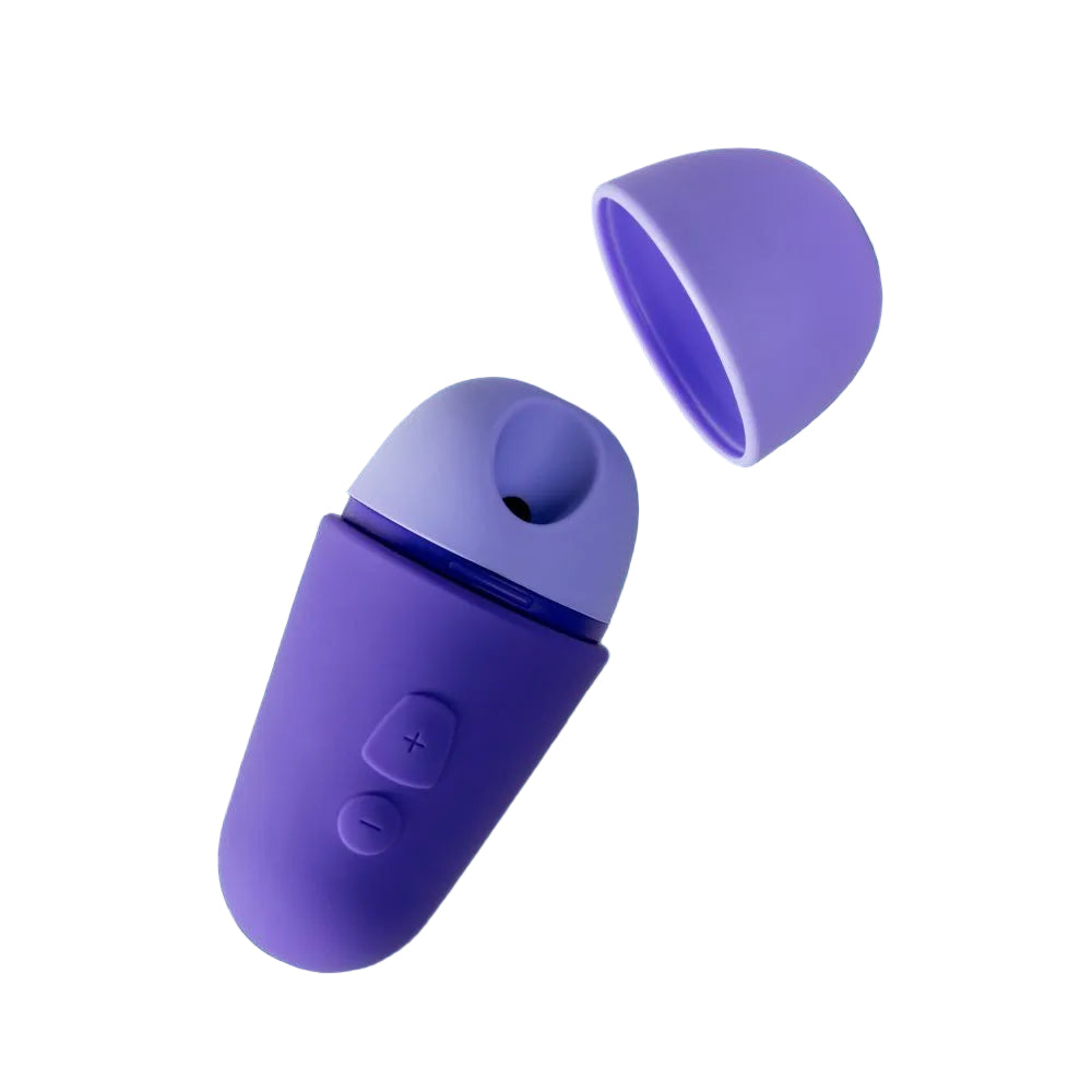 Purple air pulse toy with raised buttons on a dark blue background.