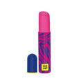 A pink lipstick shaped air driven sex toy with a blue and pink wavy patterned tube, shown with its blue cap off next to it on a white background. 
