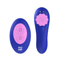 A dark blue and pink personal massager shown next to its remote control.