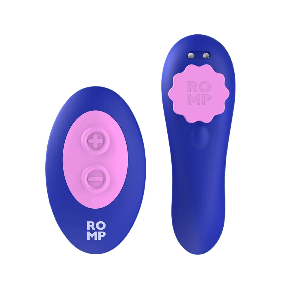 A dark blue and pink personal massager shown next to its remote control.