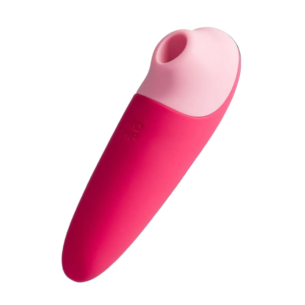 Pink and light pink sex toy, about the length of a person's hand, with a circular opening for air to pulsate.