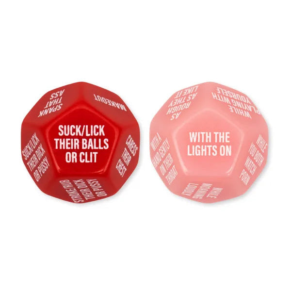 Two dice with sexy sayings on them