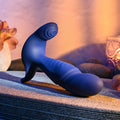 Blue plug with a mild curve. Slightly tapered tip and an anchor shaped base.