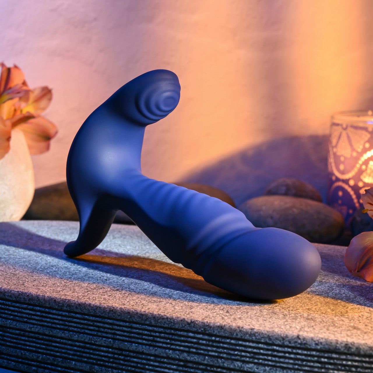 Blue plug with a mild curve. Slightly tapered tip and an anchor shaped base.